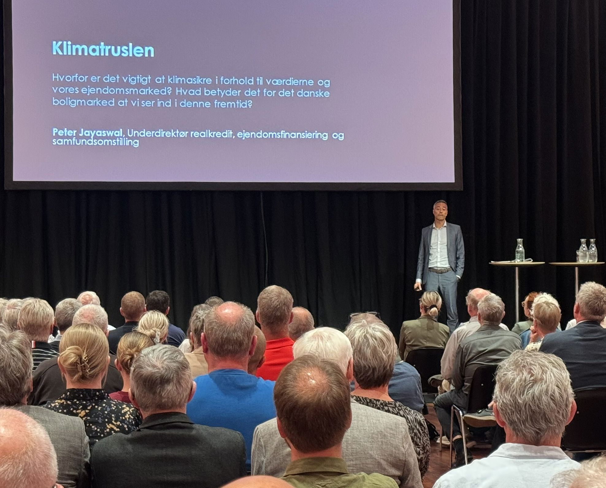 Peter Jayaswal fra Finans Danmark holder præsentation om klimatruslen